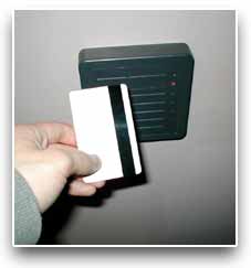 Photograph of a cardkey and a cardkey-reading device.